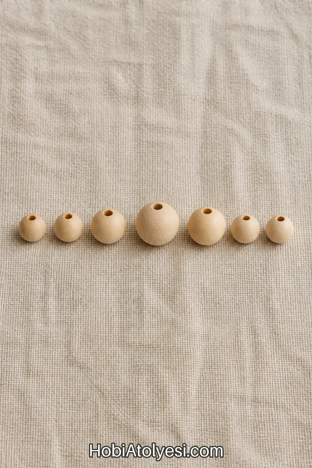 Boncuklar desen halinde sıraya dizilmiş: 6,6,8,10,8,6,6.