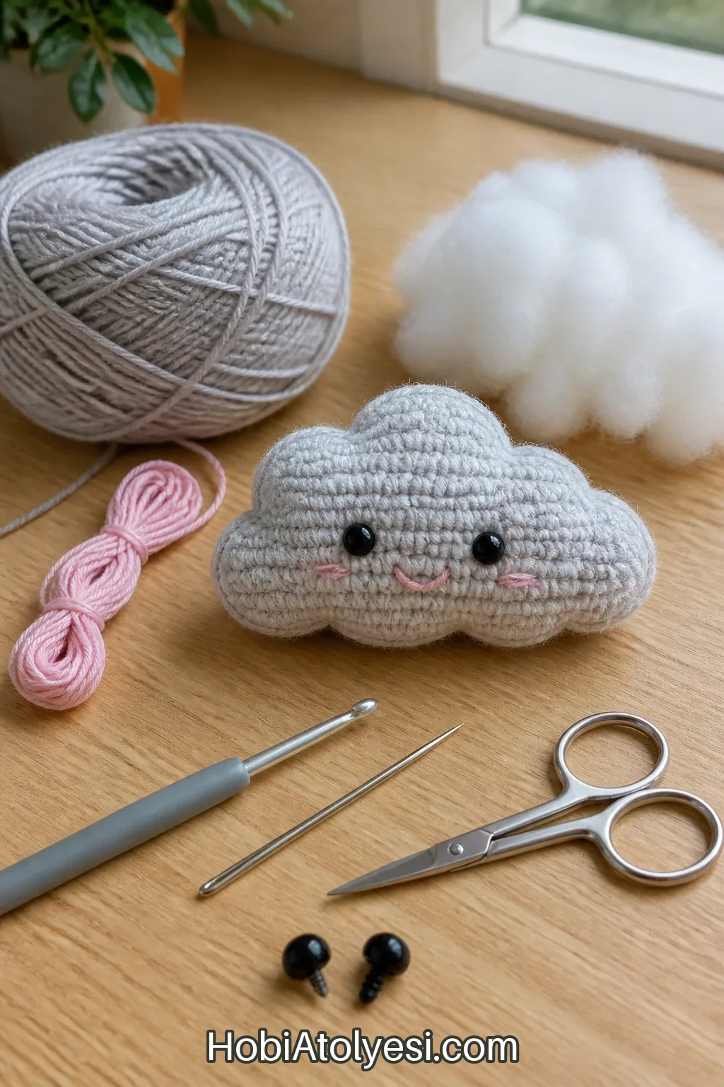 Malzemeler: açık gri amigurumi ip, pembe nakış ipi, dolgu elyafı, tığ, makas, dikiş iğnesi, güvenli gözler veya nakış seçeneği